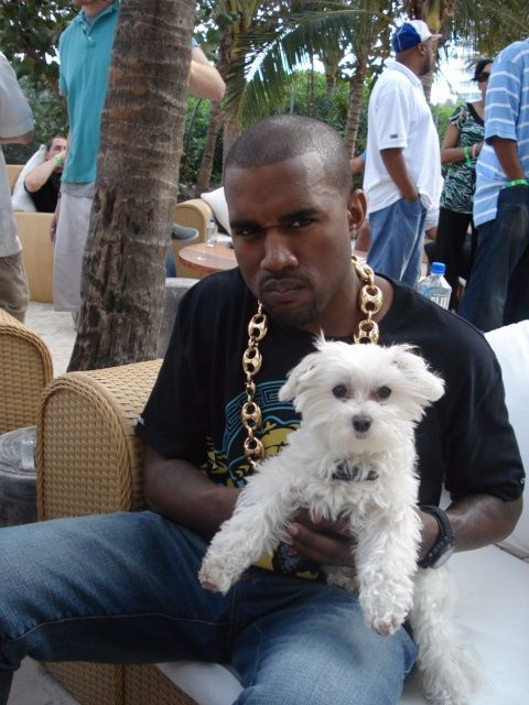 kanye west with a puppy